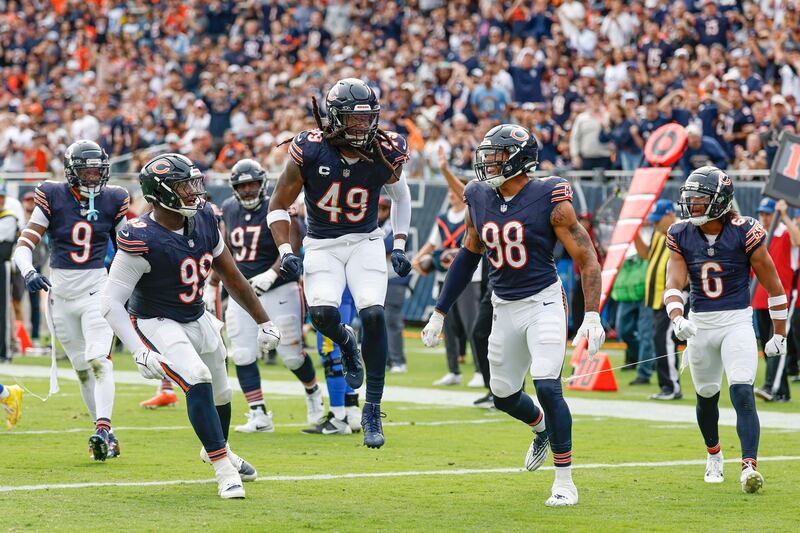 Chicago Bears linebacker Tremaine Edmunds (49) celebrates after a defensive stop against the Los Angeles Rams during the second half of an NFL football game, Sunday, Sept. 29, 2024, in Chicago. The Bears defeated the Rams 24-18. (AP Photo/Kamil Krzaczynski)