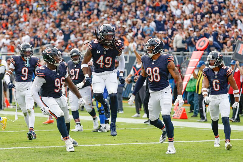 Chicago Bears linebacker Tremaine Edmunds (49) celebrates after a defensive stop against the Los Angeles Rams during the second half of an NFL football game, Sunday, Sept. 29, 2024, in Chicago. The Bears defeated the Rams 24-18. (AP Photo/Kamil Krzaczynski)