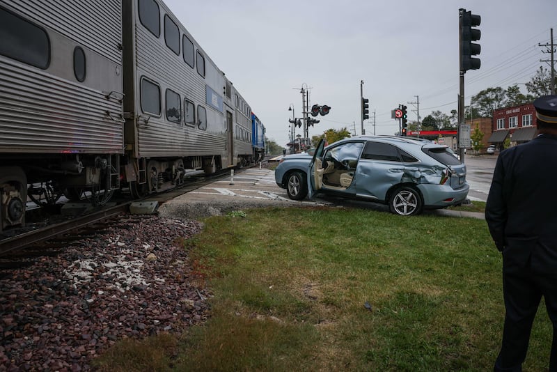 A driver suffered minor injuries after crashing into a Metra train on Oct. 13, 2025 at the intersection of Route 14 and Algonquin Road in Fox River Grove.