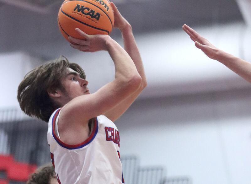 Dundee-Crown’s Jared Russell drains an outside jumper against Wauconda in varsity basketball Friday, Dec. 20, 2024 at Dundee-Crown High School in Carpentersville.
