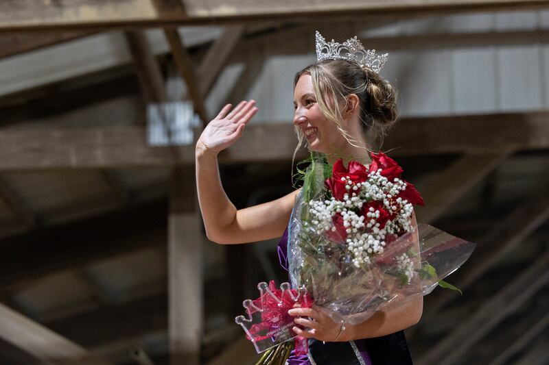 Ruby Mulvaney waves after being crowned the Ogle County Queen Thursday, July 30, 2025, at the Ogle County Fairgrounds.
