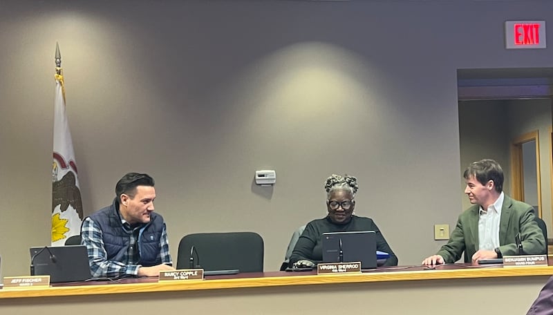 Third Ward Alderperson Jeff Fischer talks with 4th Ward Alderpersons Virginia Sherrod and Ben Bumpus before a Sycamore City Council meeting on March 3, 2025.