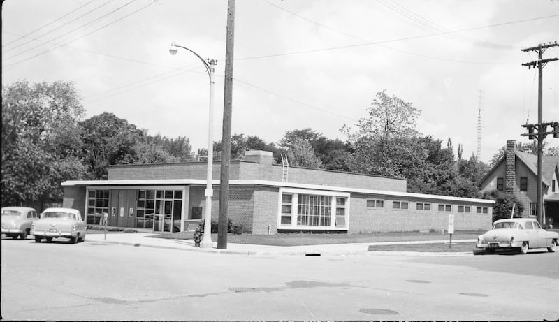 Looking northwest at the DeKalb-Ogle Telephone Company at Locust and Third Streets in DeKalb in June 1959.