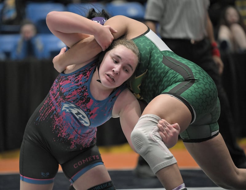 Payton Temple, of Iroquois West wrestles chicago Kelly’s Sara Martiniz-Lopez in the 190-pound class at the girls wrestling state finals tournament at Grossinger Arena in Bloomington on Saturday, Feb. 28, 2026.