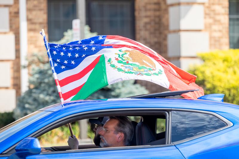 Mexican and American colors are flown Saturday, Sept. 14, 2024, through the Sauk Valley Fiesta Days parade.