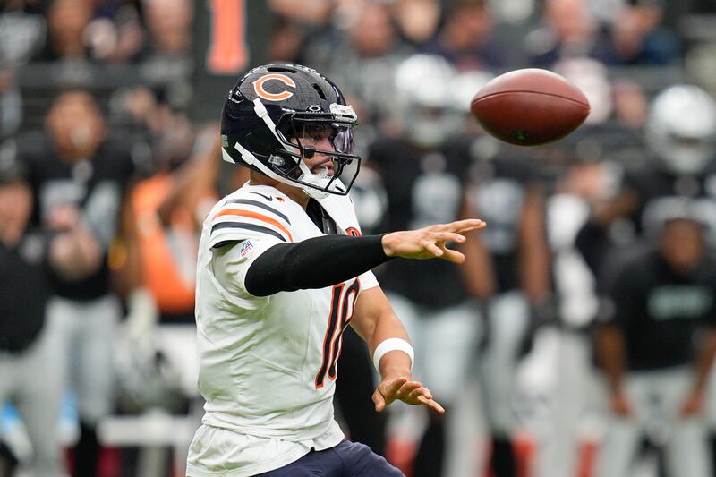 Chicago Bears quarterback Caleb Williams (18) throws a pass during the first half of an NFL football game against the Las Vegas Raiders Sunday, Sept. 28, 2025, in Las Vegas. (AP Photo/John Locher)