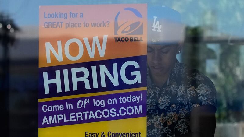 US jobless aid filings fell to 209,000 last week as layoffs remain low despite economic uncertainty