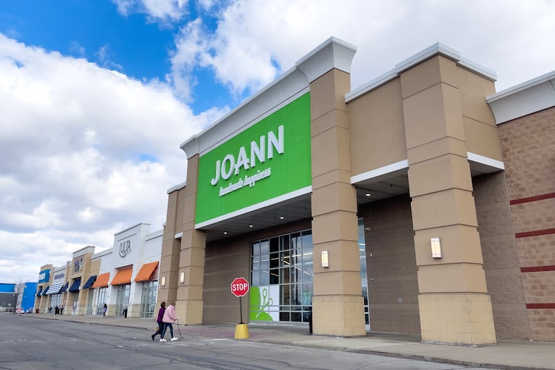People walk into the Joann Fabrics store on Route 50 in Bourbonnais on Thursday, Feb. 27. The craft retailer announced it will close all stores nationwide.