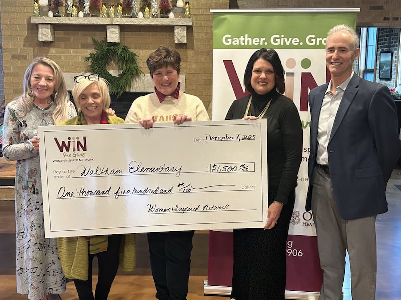 Starved Rock County Community Foundation founder Pamela Beckett (from left), Women Inspired Network grants chair Debbie Buffington, Waltham Elementary School teacher Kathleen Diluciano, Women Inspired Network steering committee co-chair Cherie Reynolds, and Starved Rock County Community Foundation CEO Fran Brolley