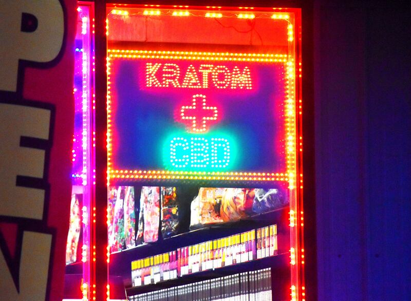 A shop advertises for Kratom, a fairly new recreational drug with adverse effects.