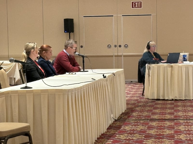 Ottawa Mayor Robb Hasty speaks to the Illinois Department of Public Health state board Tuesday in Bolingbrook, joined by State Rep. Amy “Murri” Briel and Citizens for Healthcare in Ottawa member Colleen Burns, as they urged reconsideration of OSF’s consolidation plan.