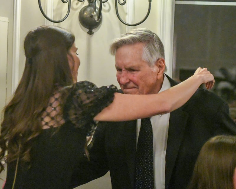 Harrison Schneider gets a hug from his granddaughter Brianna Wynne after Schneider was named Charlemagne Award winner on Friday May 1, 2026.