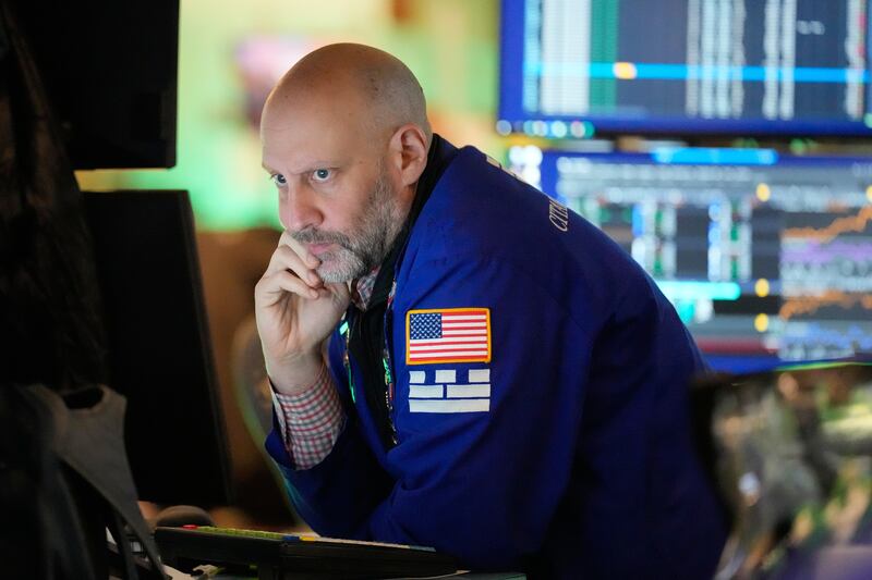 Meric Greenbaum works on the floor at the New York Stock Exchange in New York, Tuesday, March 3, 2026. (AP Photo/Seth Wenig)