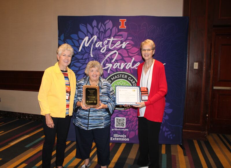 Lee County Master Gardeners received a Team Award at the Master Gardener state conference. Lee County Master Gardeners pictured with the award are (from left) Judy Truckenbrod, Mary Kathryn Stenzel, and Karen Stenzel.