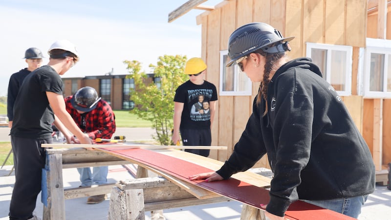 Huntley High students build their own classroom
