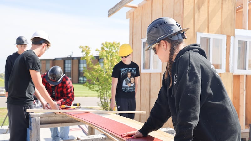 Huntley High students build their own classroom