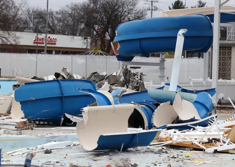 The remnants of one of the slides Tuesday, December 10, 2024, as demolition continues at Hopkins Pool in preparation for construction of a new pool set to open in 2026 at Hopkins Park in DeKalb.