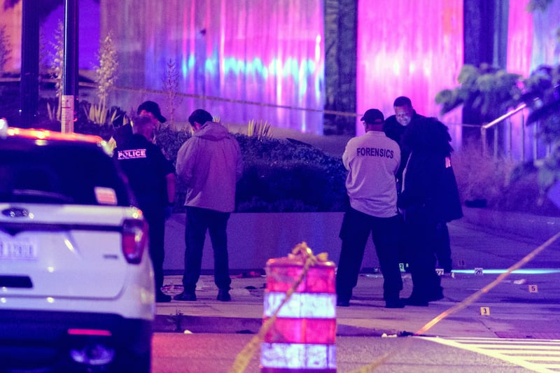 Law enforcement work the scene after two staff members of the Israeli Embassy in Washington were shot and killed outside the Capital Jewish Museum, Thursday, May 22, 2025, in Washington.. (AP Photo/Rod Lamkey, Jr.)