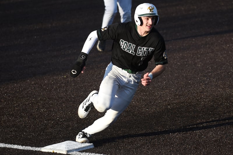 Coal City's Gavin Berger rounds third on his way in for a run during the Coalers' game at Herscher Monday, April 20, 2026.