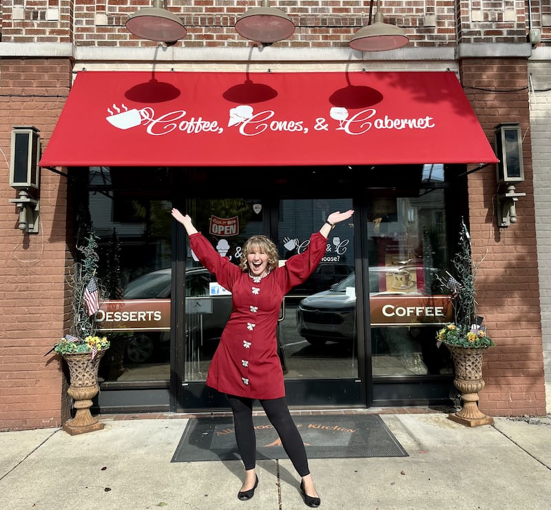 Marissa Kirch with her new business, Coffee, Cones & Cabernet at 33 S. Third St., Geneva. Kirsch bought the All Chocolate Kitchen when owners Alain and Esther Roby retired in June. Kirch said though the name has changed, staff and its offerings have stayed the same.