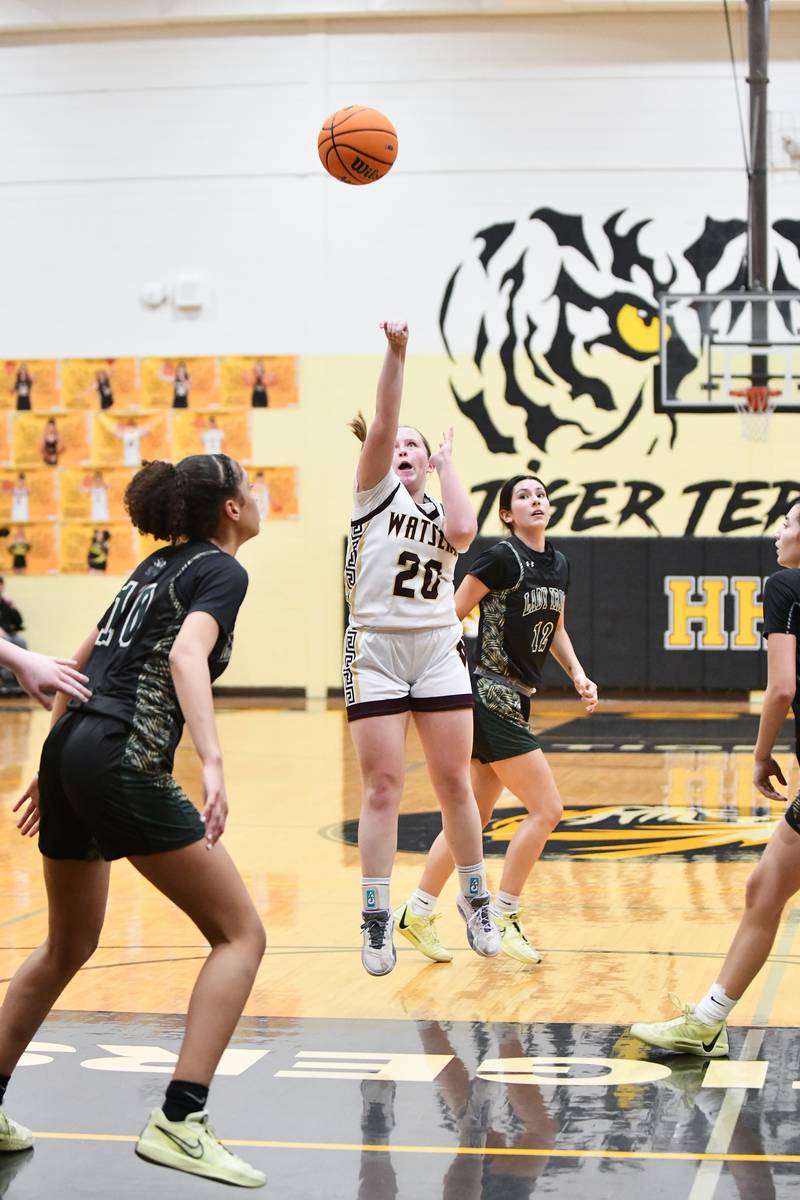 Watseka-Milford's Noelle Schroeder shoots a jump shot during the Warriors' 69-38 loss to Bishop McNamara in the IHSA Class 2A Herscher Sectional championship on Thursday, Feb. 27.