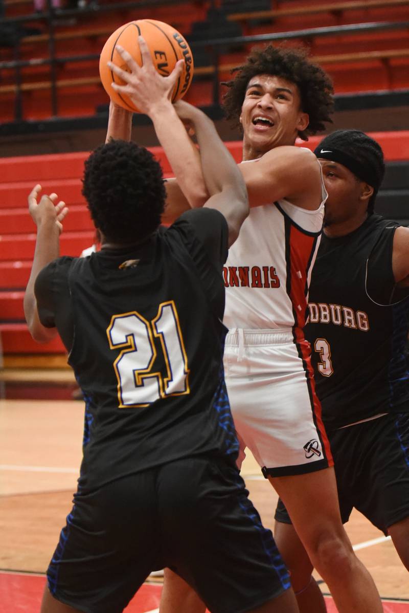 Bradley-Bourbonnais' Dajuan Brown takes a shot as he's fouled by Sandburg's Daniel Morakinyo (21) during a game at Bradley-Bourbonnais Tuesday, Feb. 3, 2026.