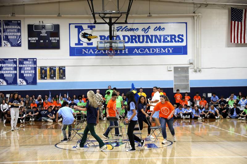 Nazareth students participate in a game of musical chairs on Friday, Sept. 27, 2024 during the La Grange Park school’s annual Homecoming Pep Rally.
