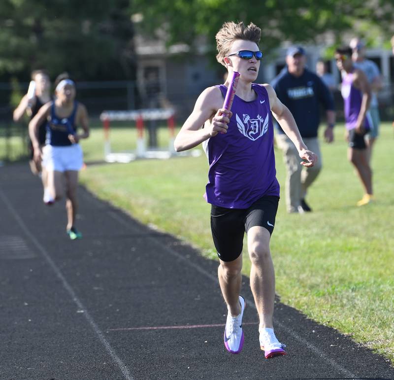 Dixon's Ethan Carter cruises to first place as the anchor for the Dukes' 4x800 relay at the Big Northern Conference Meet at Stillman Valley on Thursday, May 14, 2026.