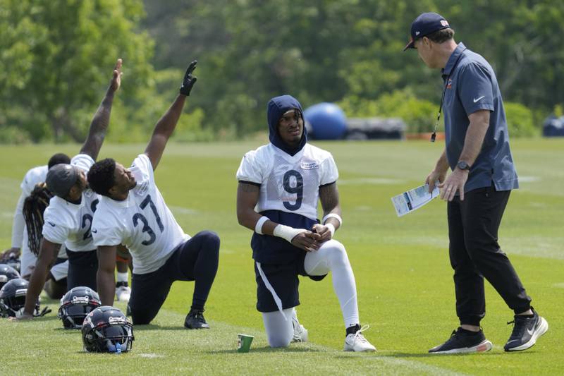 Chicago Bears defensive back Jaquan Brisker listens to head coach Matt Eberflus during OTA practice, Wednesday, June 7, 2023, in Lake Forest.