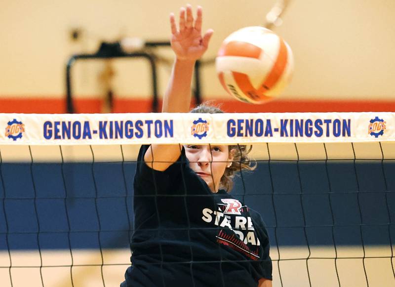 Genoa-Kingston’s Alivia Keegan spikes the ball during a drill at practice Thursday, Aug. 10, 2023, at the school in Genoa.