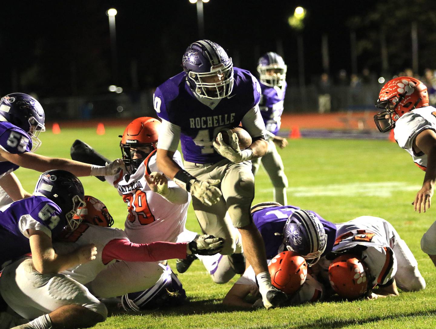 Rochelle's Roman Villalobos takes in a touchdown during Friday's game with Waterloo.
