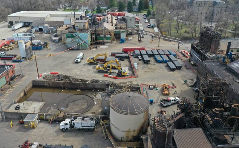 Dozens of garbage dumpsters remain at the site along with excavators as crews continue to clean the area of destruction from the chemical fire three-months later at Carus Chemical on Tuesday, April 11, 2023 in La Salle.