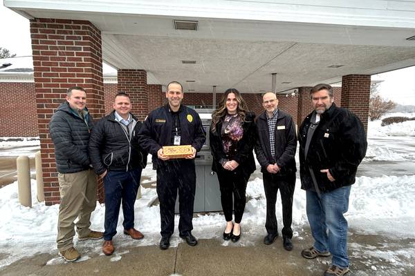 The First National Bank in Amboy donates card skimmer detection devices to Dixon Police Department