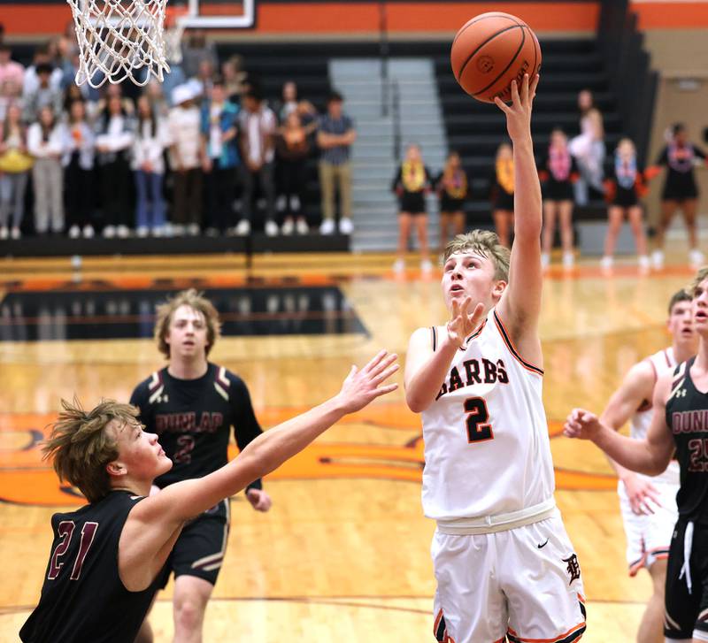 DeKalb's Sean Reynolds shoots over Dunlap's Alexander Evans during their game Monday, Nov. 21, 2022, at DeKalb High School.