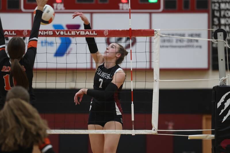 Plainfield North’s Riley Cunningham hits a shot down the line against Plainfield East on Tuesday, Oct. 10, 2023 in Plainfield.