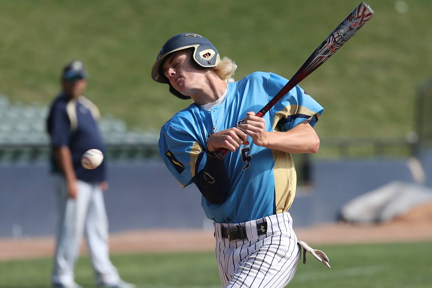 Marquette’s Logan Nelson gets hit by a pitch against Leroy in the IHSA Class 1A 3rd place game. Saturday, June 4, 2022 in Peoria.