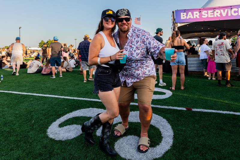 Joliet residents Amanda Banach and Tom Czeszak enjoy country music night at Taste of Joliet on June 21, 2025.