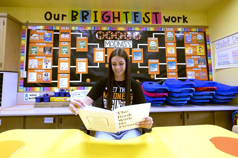 Britney Pitzer, third grade teacher at Jefferson in Dixon, reads the champion book “The Book With No Pictures.”
