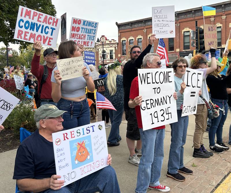 There were a variety of signs carried by demonstrators on Saturday, Oct. 18, 2025 at the No Kings rally on the Ogle County Courthouse square in Oregon, Illinois to protest actions and decisions by President Donald Trump and his administration.