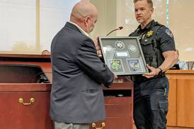 Longtime Oswego police commissioner honored for his efforts