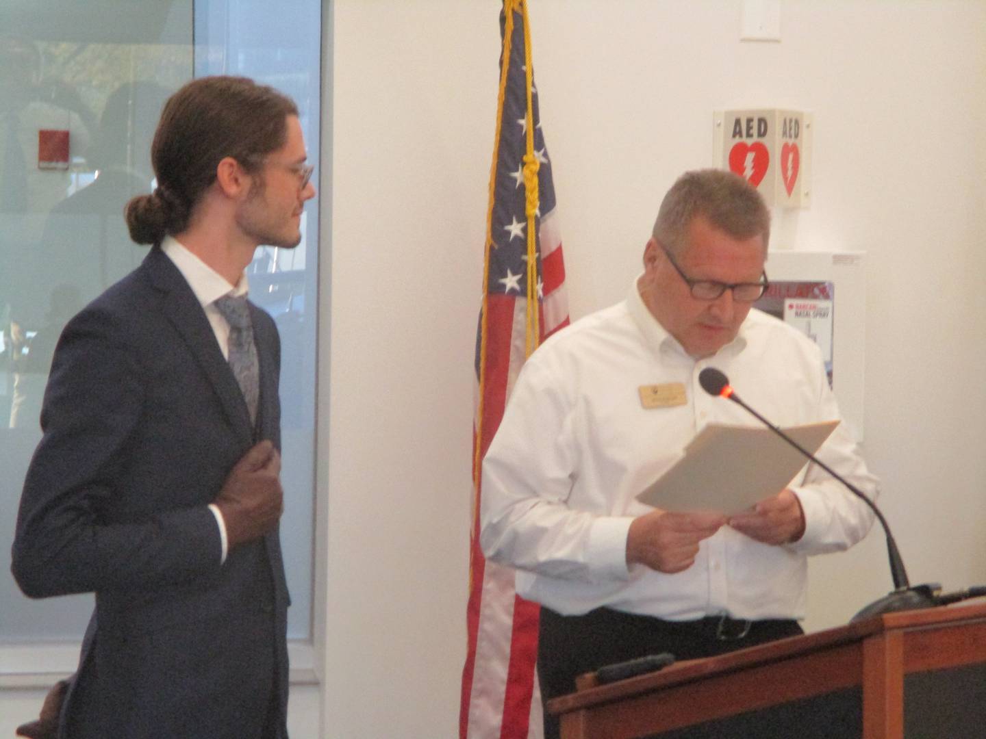 New Joliet Junior College Trustee Josh Stamborski (left) is sworn into office by board Chairman Jim Budzinski after being elected at a meeting on Oct. 7, 2024 to fill a vacant board seat.