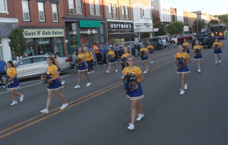 Logan Jr. High poms march during the homecoming parade on Thursday, Sept. 25, 2025 along South Main Street in Princeton .