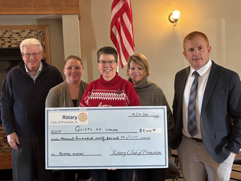 Princeton Rotary Club presented Terry Johnson from the Illinois Quilts of Valor with a check for $9,475 raised at the Rotary Annual Auction event held on Nov. 11, 2023.