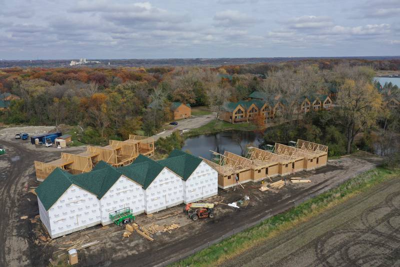 Crews rebuild cabins at Grand Bear Resort at Starved Rock on Wednesday, Nov. 1, 2023 near Utica. A massive fire destroyed 28 units on Memorial Day Weekend in 2022. Contractors hope for a spring 2024 completion.