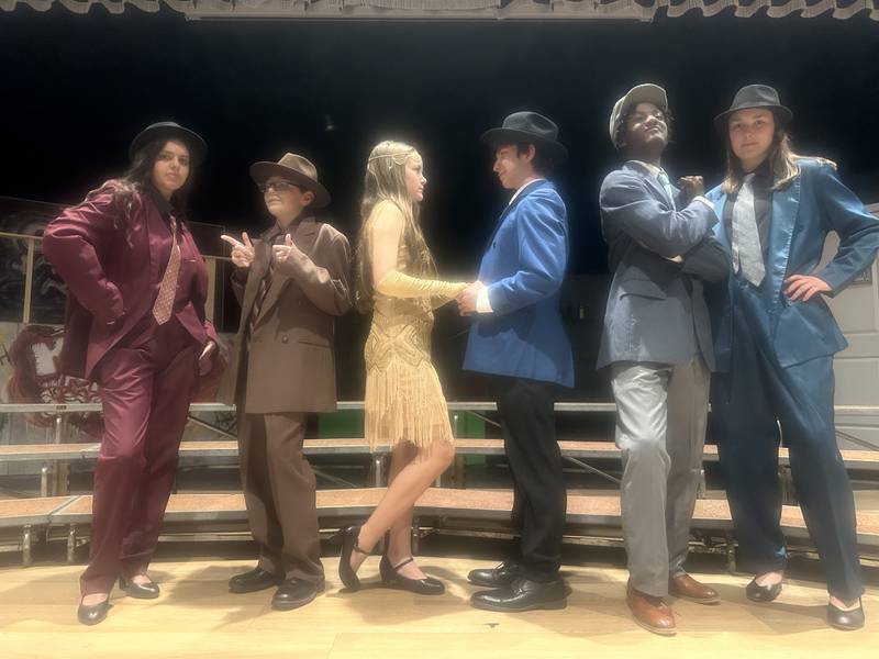 Morris Community High School students practice their parts for the upcoming "Romeo and Juliet: A Jazz Age Love Story," which begins Thursday, Oct. 23.