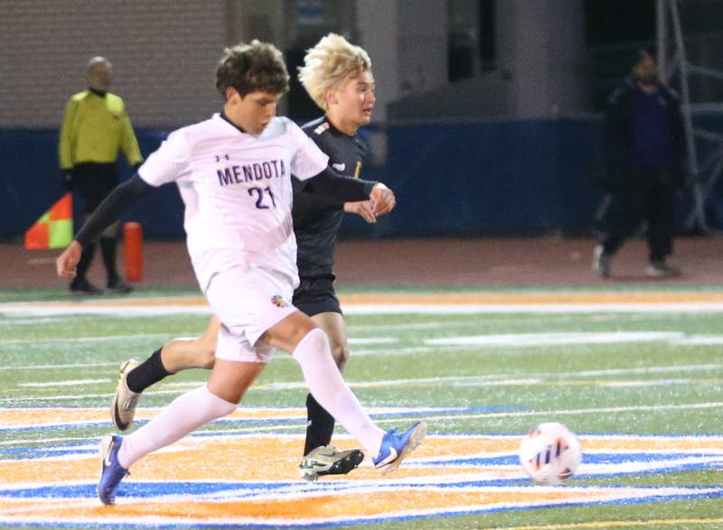 Mendota's Isaac Diaz sprints down the field in front of Normal U-High's Reed Kawakita during the Class 1A State semifinal game on Thursday, Nov. 7, 2024 at Hoffman Estates High School.