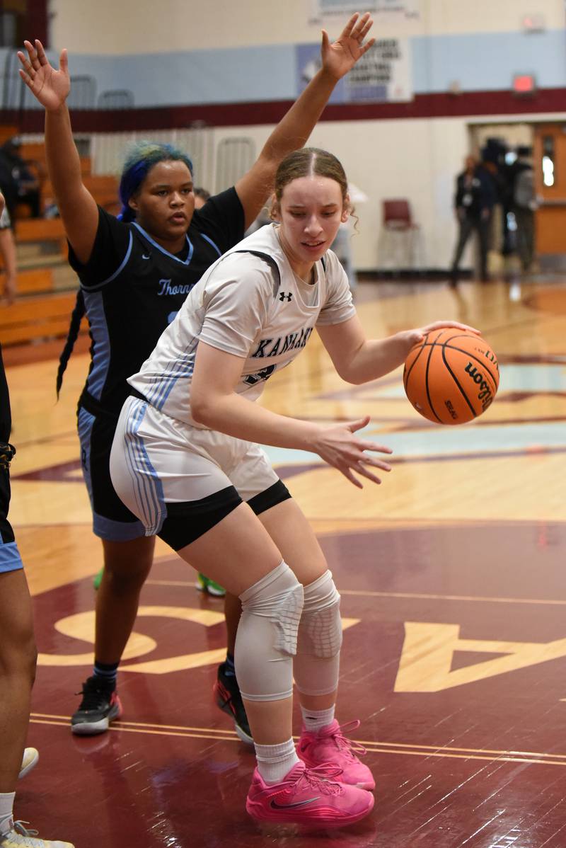 Kankakee's Ava Johnson, right, makes a post move around Thornridge's Lena Allen during a game at Kankakee Thursday, Jan. 8, 2026.