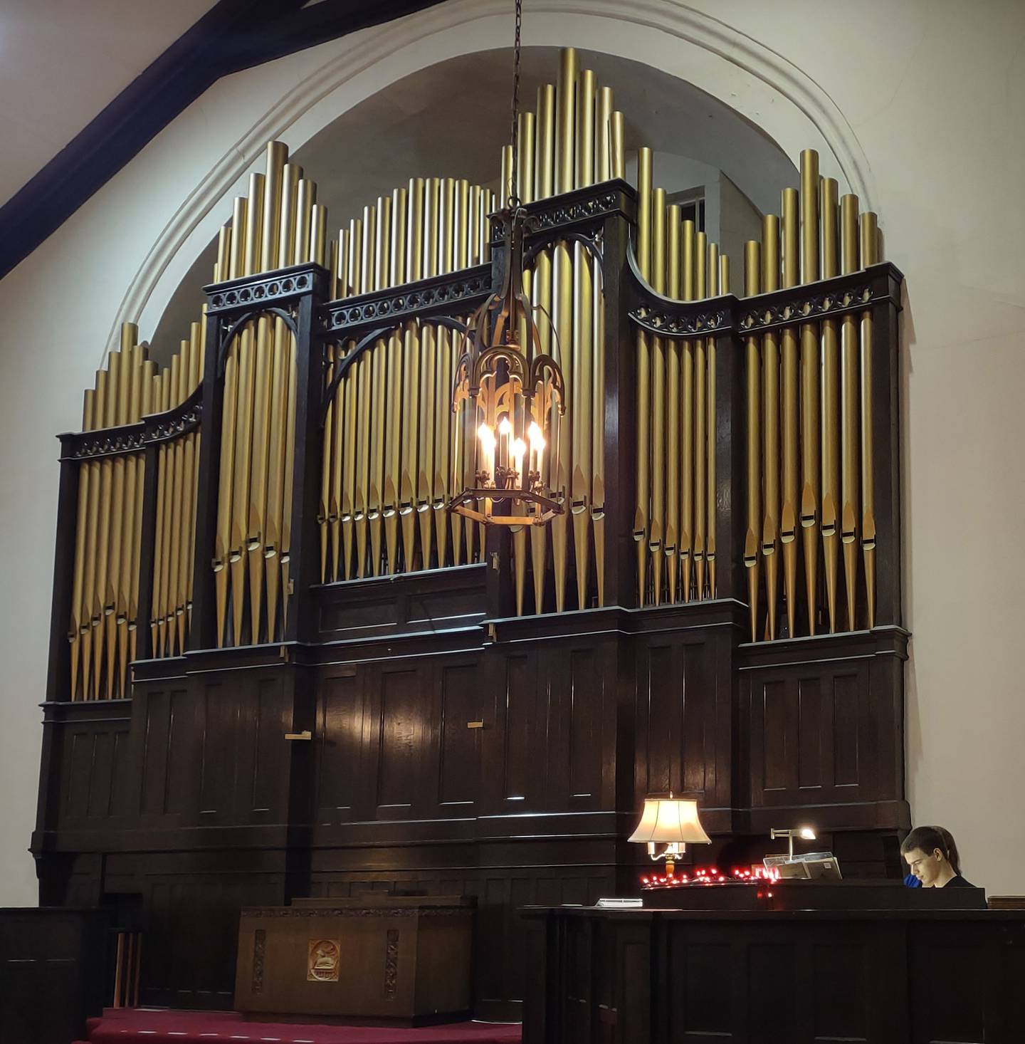 Aaron Noble (lower right) plays Bach's "Toccata and Fugue in D Minor" on the organ at Open Table United Church of Christ in Ottawa Sunday evening during the 17th annual Scary Organ and Piano Concert. Concert performers included students and colleagues of organist and pianist Anne Badger.