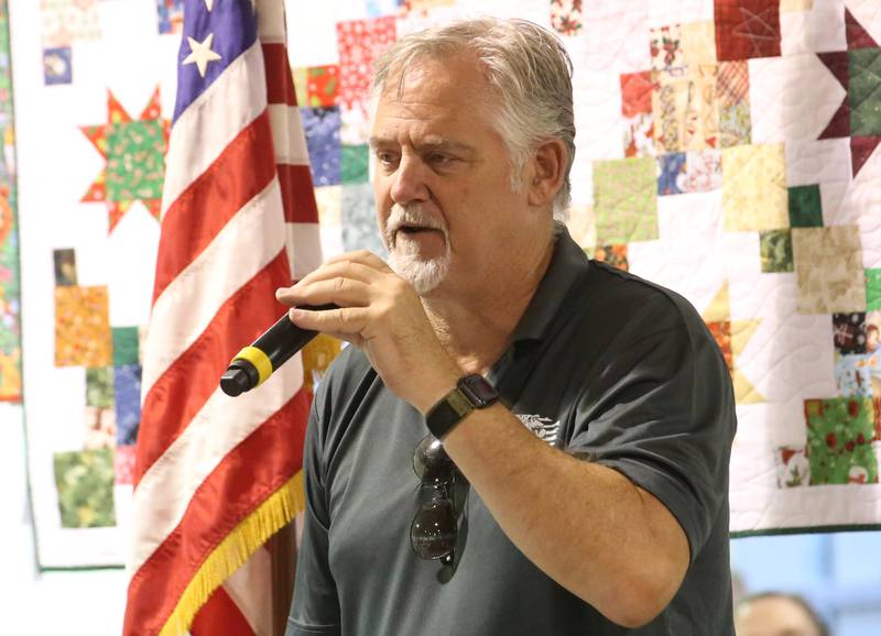 U.S. Marine Corps Veteran Dan Smith, of Princeton, sings "God Bless the USA" during the Tribute to Veterans on Wednesday, Aug. 20, 2025 at the Bureau County Fair in Princeton.