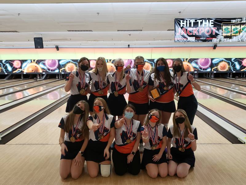 The Oswego varsity and JV girls bowling teams won the championship of Sycamore's Matt Clark Invitational on Saturday at Mardi Gras Lanes.